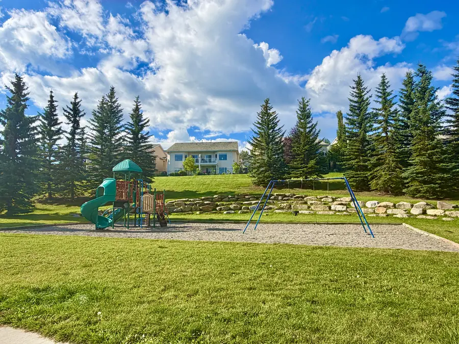 Playground and swings in Bow Ridge, Cochrane, Alberta