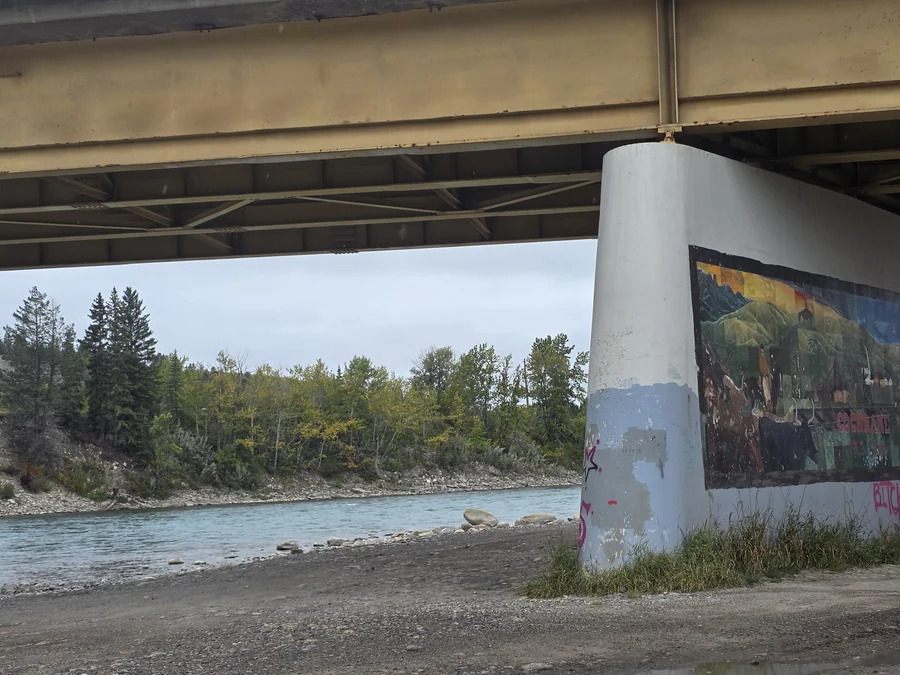 River pathway passing under the bridge beside the Bow River, Cochrane, Alberta