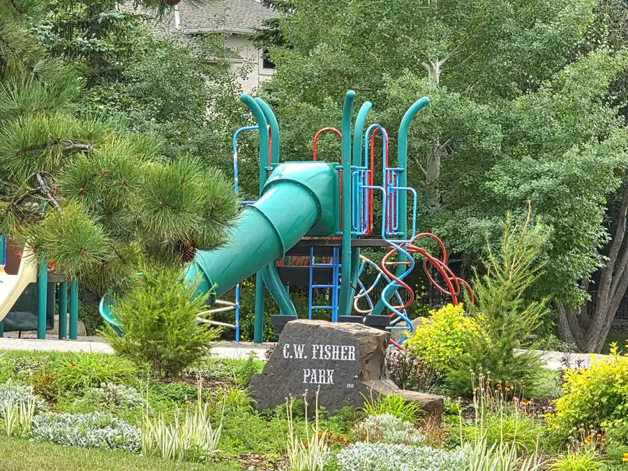 C. W. Fisher Park playground and planting in Cochrane Heights, Cochrane, Alberta