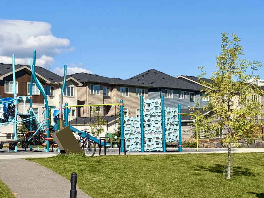 Playground and homes in Greystone, Cochrane, Alberta