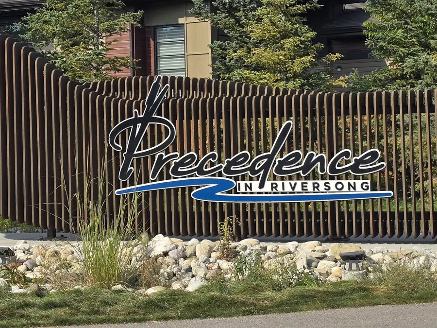 Precedence in Riversong entrance sign, Cochrane, Alberta