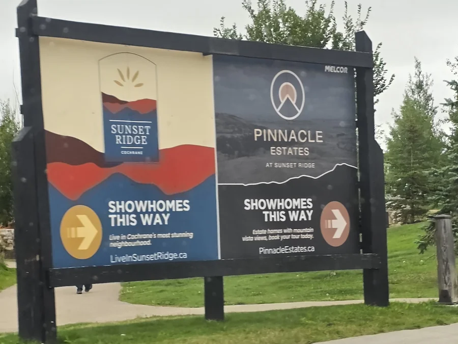 Sunset Ridge and Pinnacle Estates showhome sign, Cochrane, Alberta